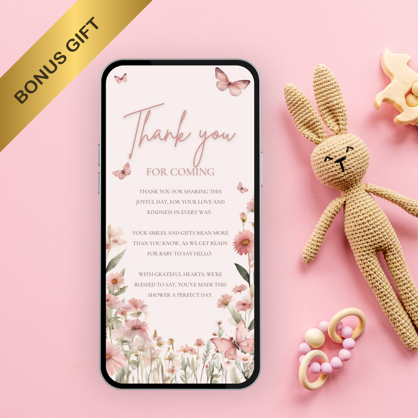 Canva butterfly baby shower invite shown on a mobile phone for easy customization